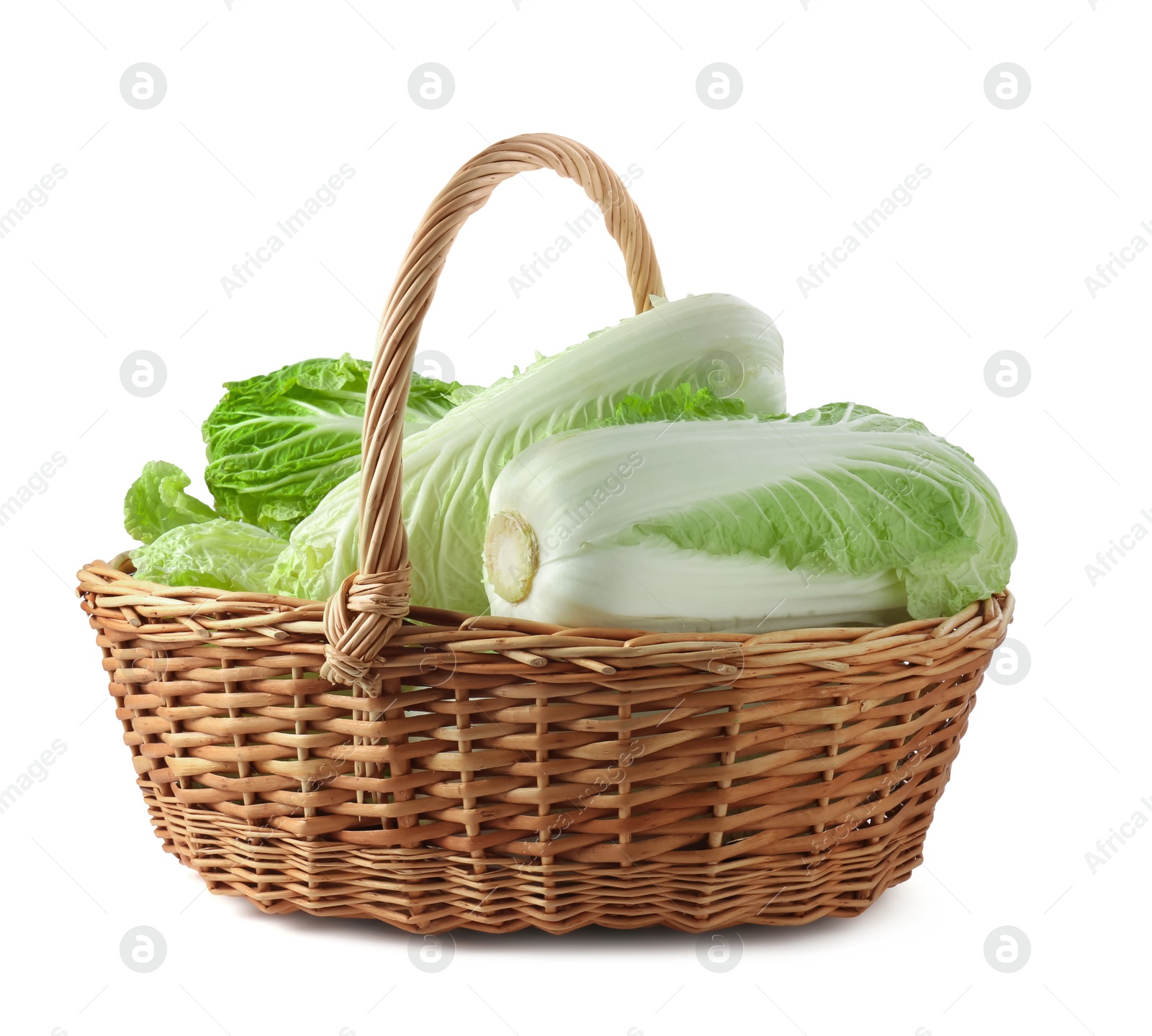 Fresh Chinese cabbages in wicker basket isolated on white Photo of Fresh Chinese cabbages in wicker basket isolated on white
