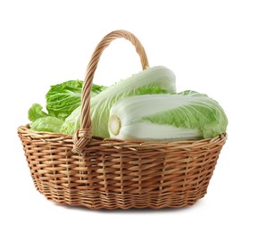 Photo of Fresh Chinese cabbages in wicker basket isolated on white