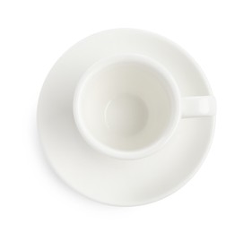 Photo of Empty coffee cup with saucer isolated on white, top view