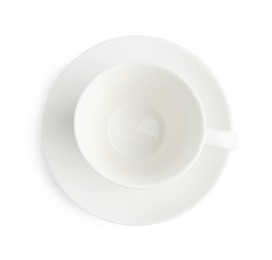 Photo of Empty coffee cup with saucer isolated on white, top view