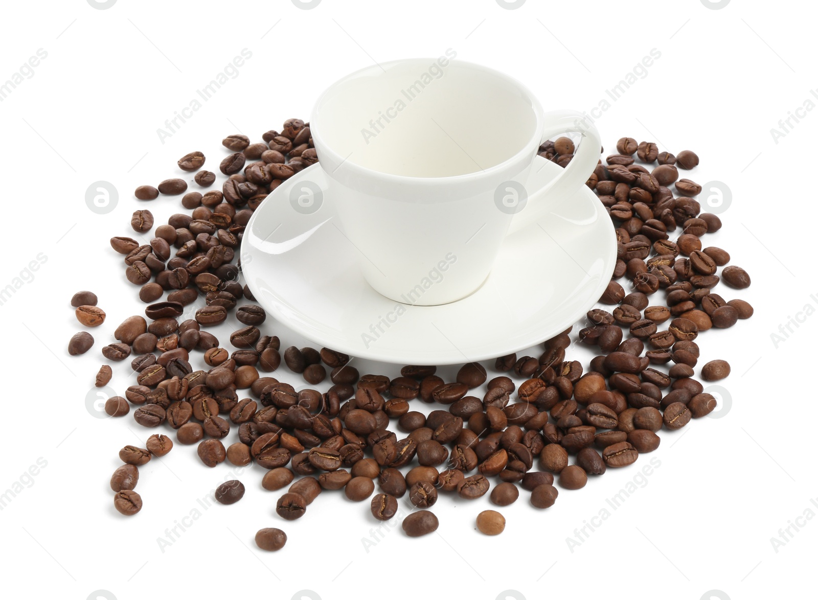 Ceramic cup with roasted coffee beans isolated on white Photo of Ceramic cup with roasted coffee beans isolated on white