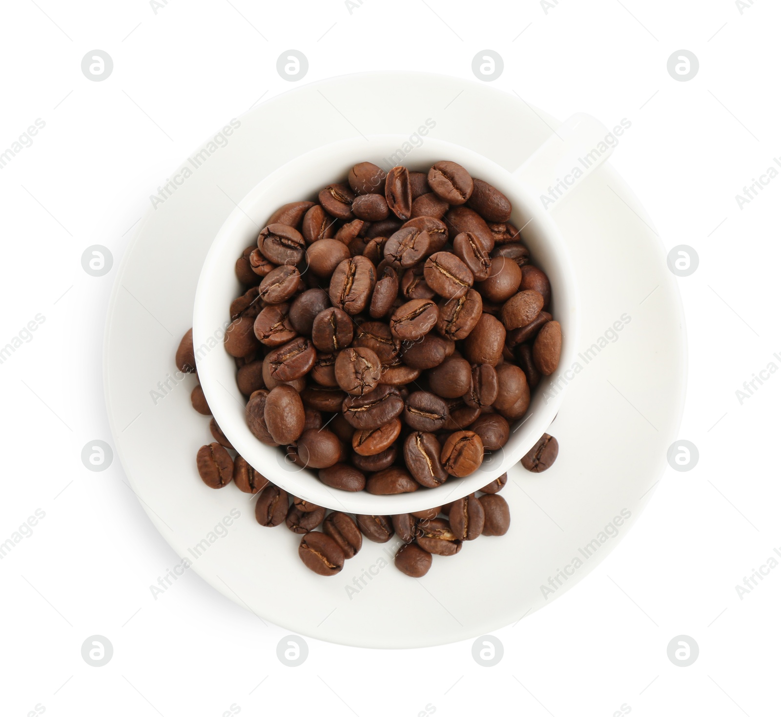 Ceramic cup with roasted coffee beans isolated on white, top view Photo of Ceramic cup with roasted coffee beans isolated on white, top view