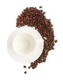 Photo of Ceramic cup with roasted coffee beans isolated on white, top view