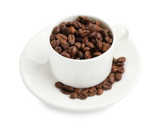 Photo of Ceramic cup with roasted coffee beans isolated on white