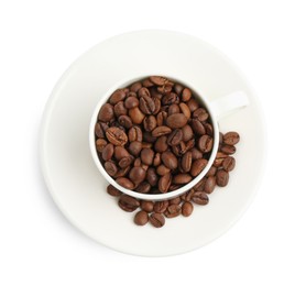 Photo of Ceramic cup with roasted coffee beans isolated on white, top view
