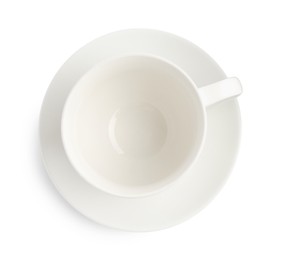 Photo of Empty coffee cup with saucer isolated on white, top view