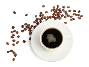 Photo of Aromatic coffee in cup and beans isolated on white, top view