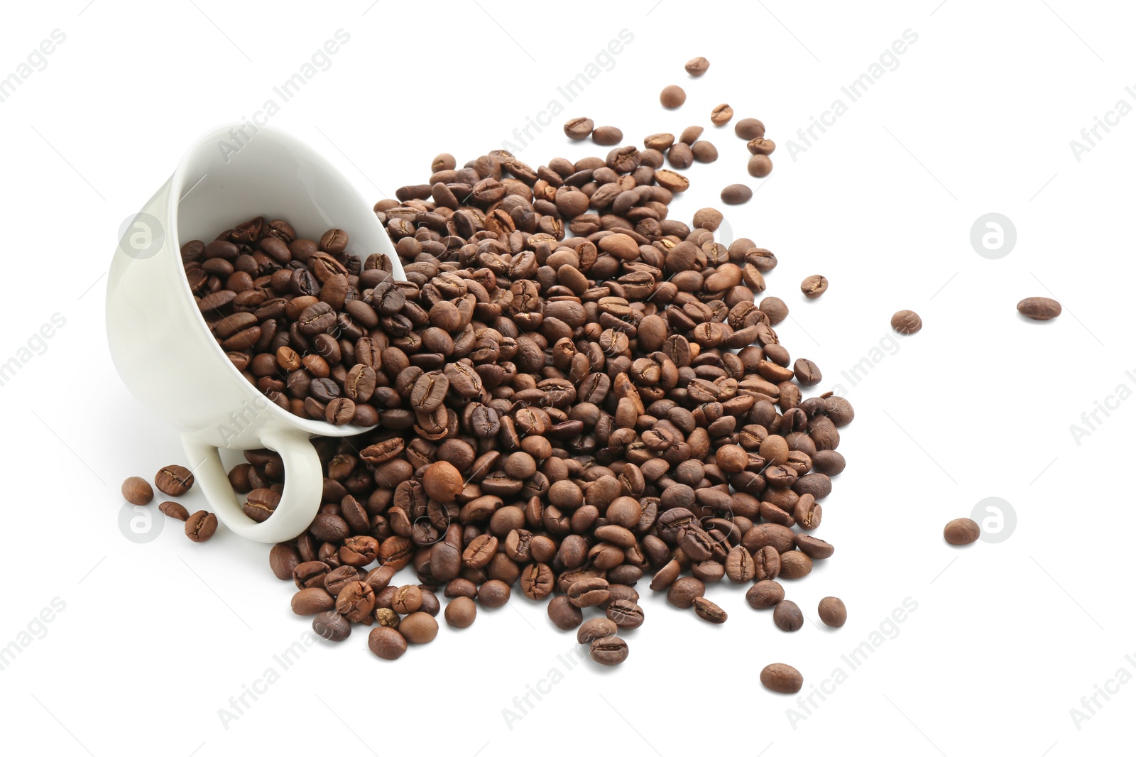 Aromatic coffee beans and cup isolated on white, above view Photo of Aromatic coffee beans and cup isolated on white, above view