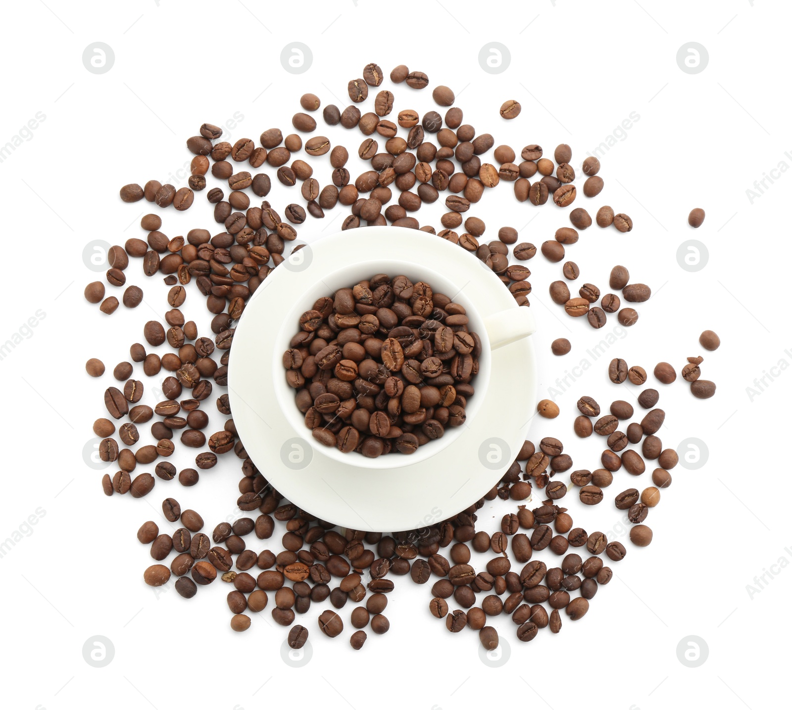 Aromatic coffee in cup and beans isolated on white, top view Photo of Aromatic coffee in cup and beans isolated on white, top view