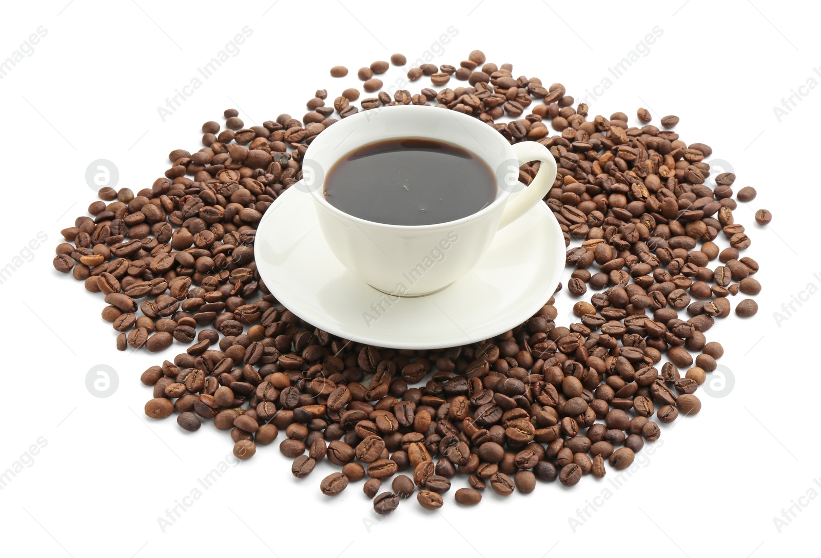 Aromatic coffee in cup and beans isolated on white Photo of Aromatic coffee in cup and beans isolated on white