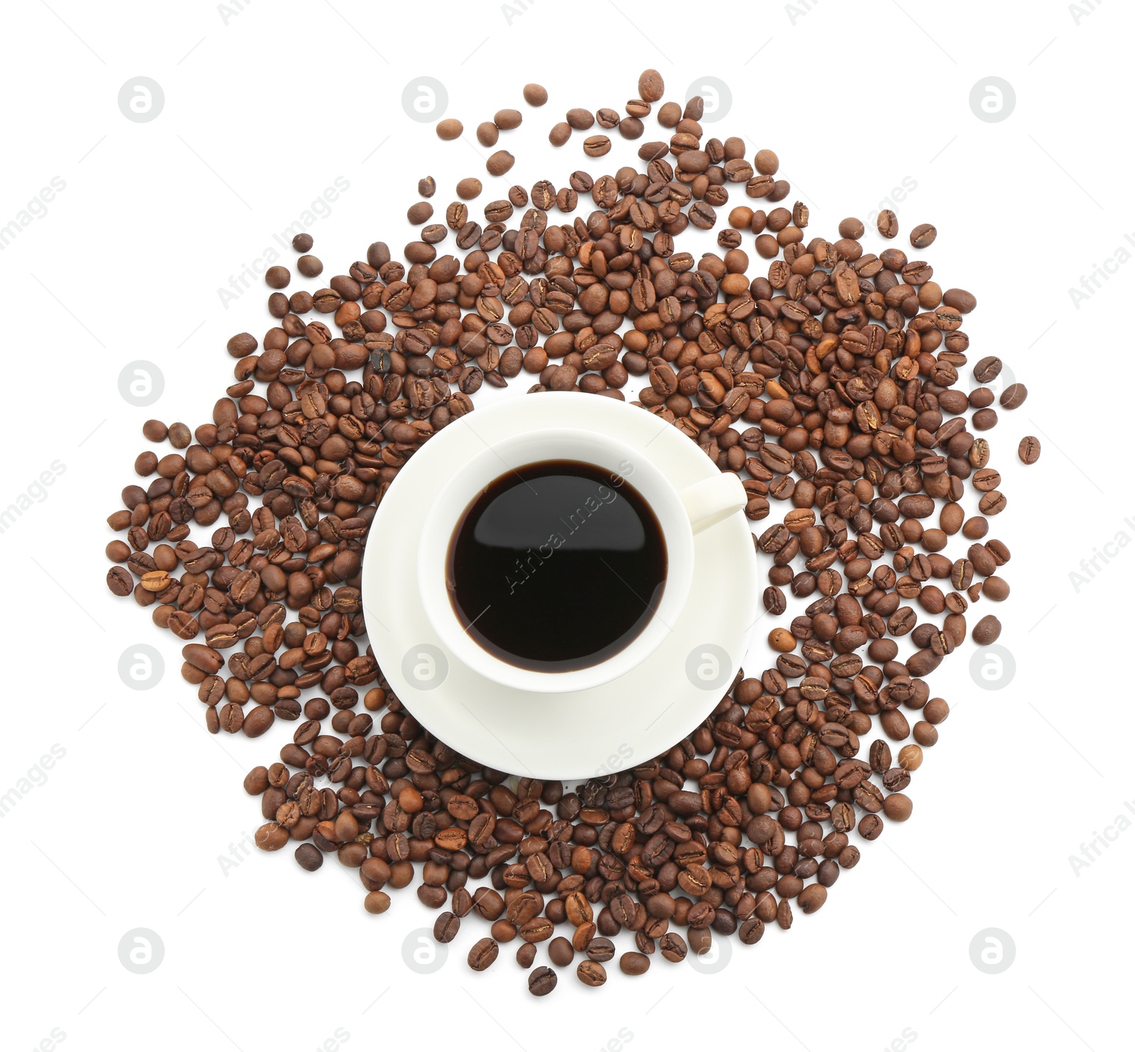 Aromatic coffee in cup and beans isolated on white, top view Photo of Aromatic coffee in cup and beans isolated on white, top view