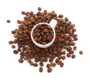 Photo of Aromatic coffee beans and cup isolated on white, top view