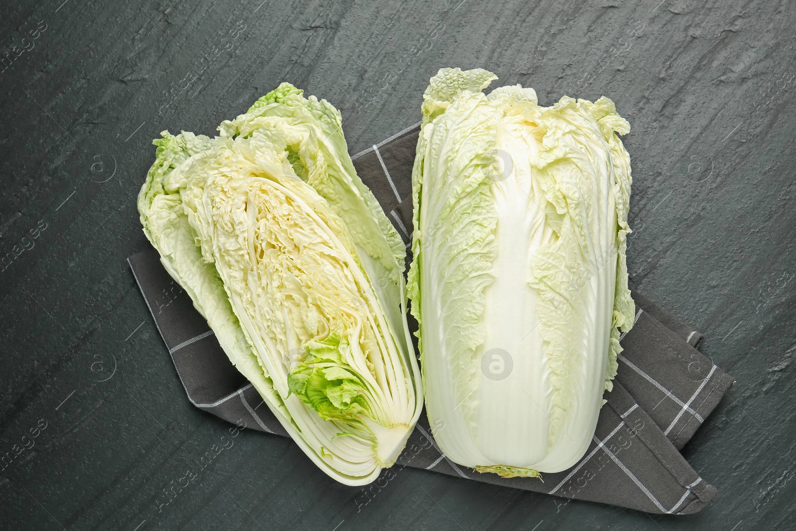 Chinese cabbages on black table, top view Photo of Chinese cabbages on black table, top view