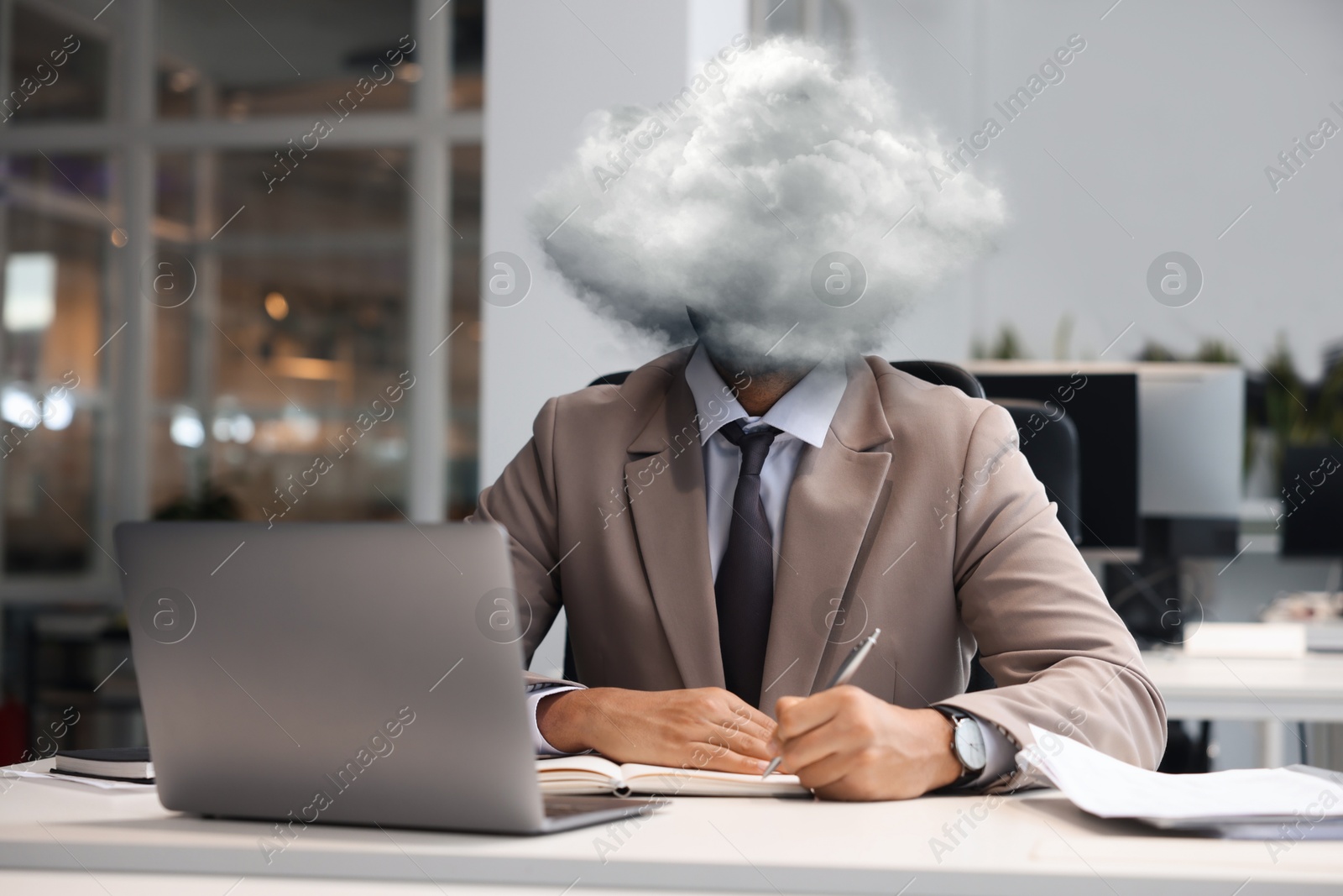 Businessman with cloud instead of head at table in office. Mental health Image of Businessman with cloud instead of head at table in office. Mental health