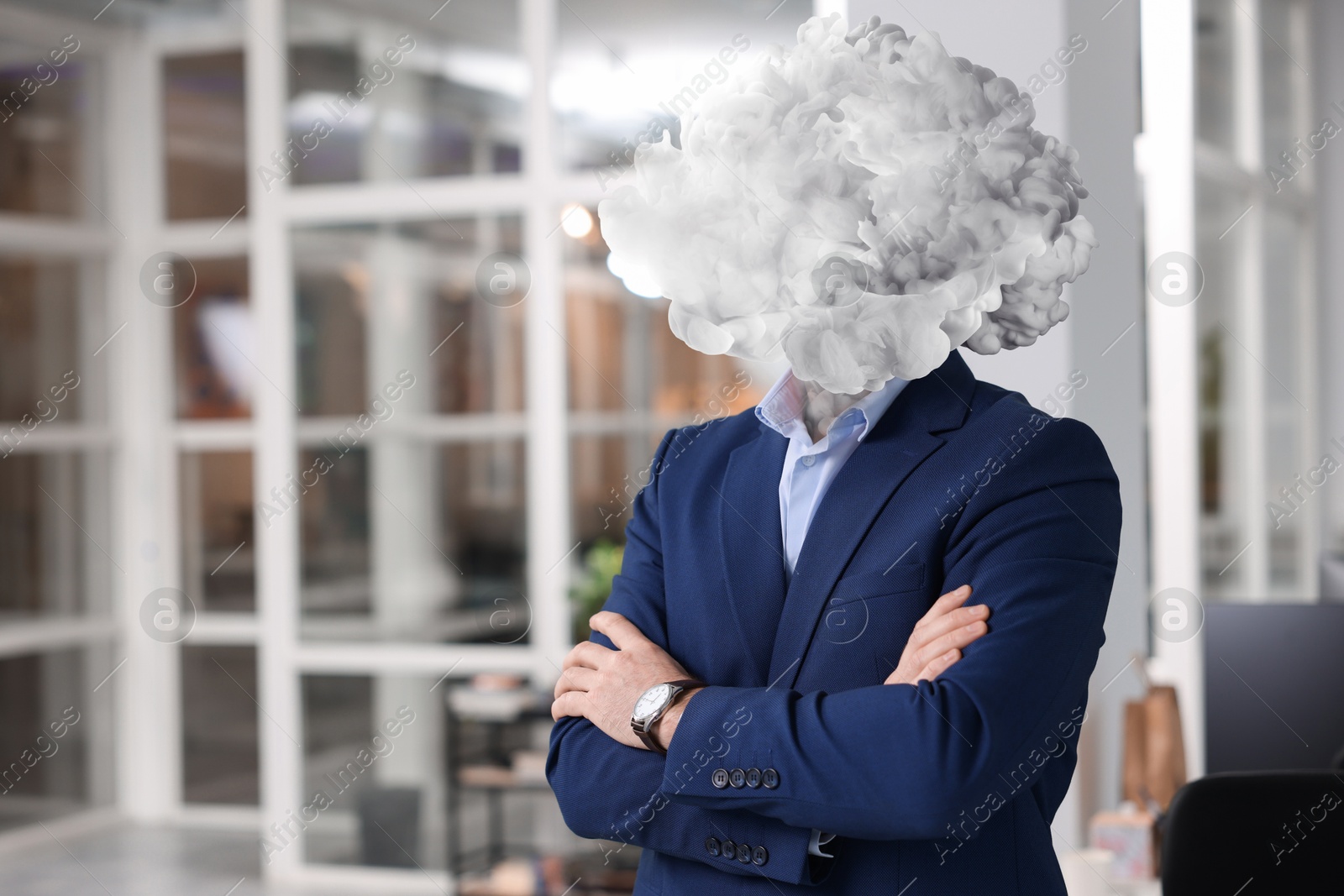 Businessman with cloud instead of head in office. Mental health Image of Businessman with cloud instead of head in office. Mental health
