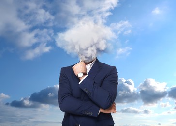 Image of Businessman with cloud instead of head against sky. Mental health