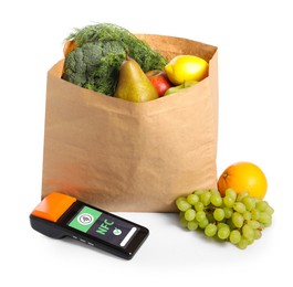 Image of Payment terminal with NFC system, food products and paper bag on white background