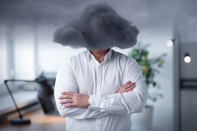 Image of Businessman with cloud instead of head in office. Mental health