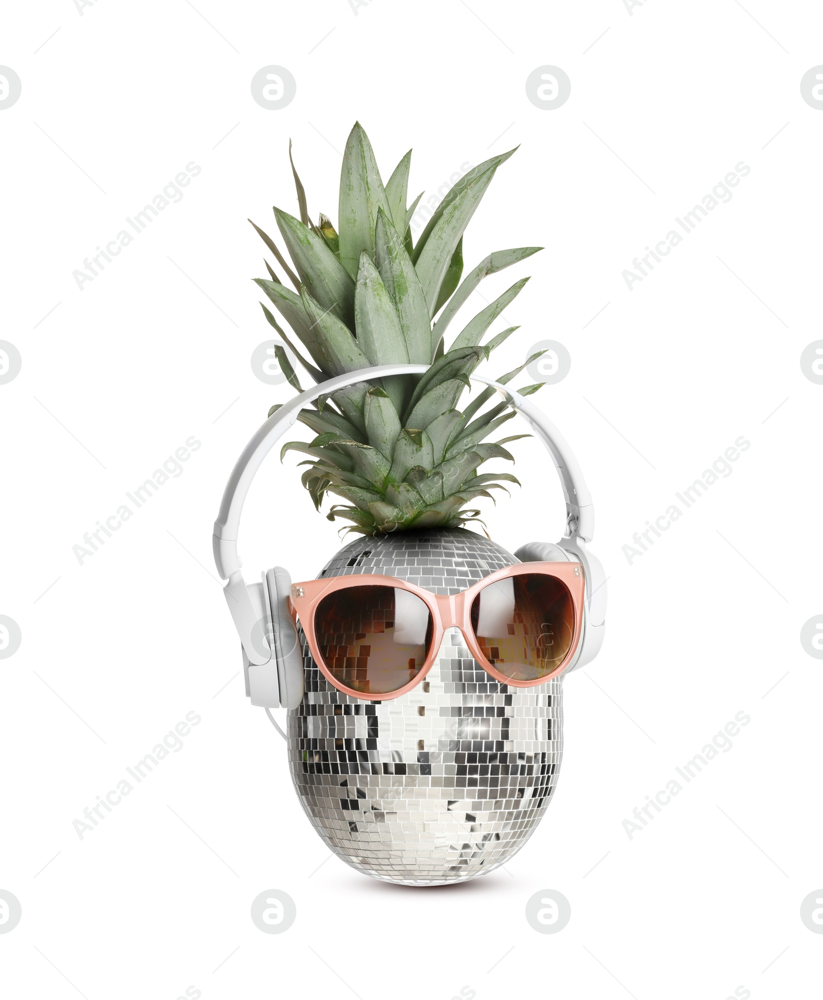 Disco ball pineapple with sunglasses and headphones on white background, creative collage Image of Disco ball pineapple with sunglasses and headphones on white background, creative collage