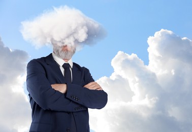 Image of Businessman with cloud instead of head against sky. Mental health