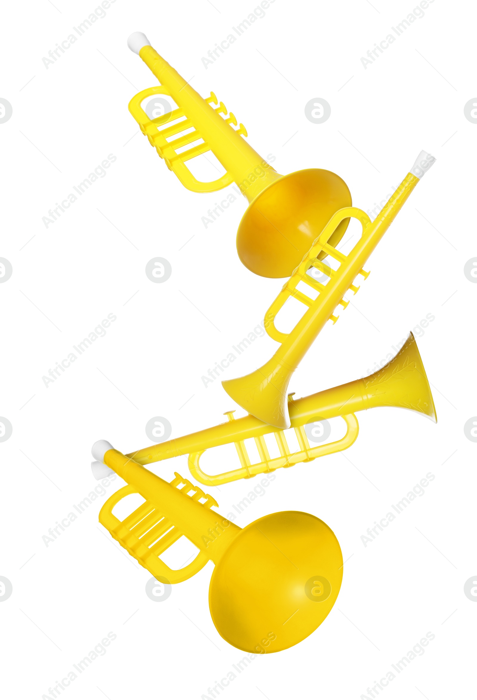 Toy horns in air on white background. Child's musical instrument Image of Toy horns in air on white background. Child's musical instrument