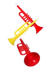 Image of Toy horns in air on white background. Child's musical instrument