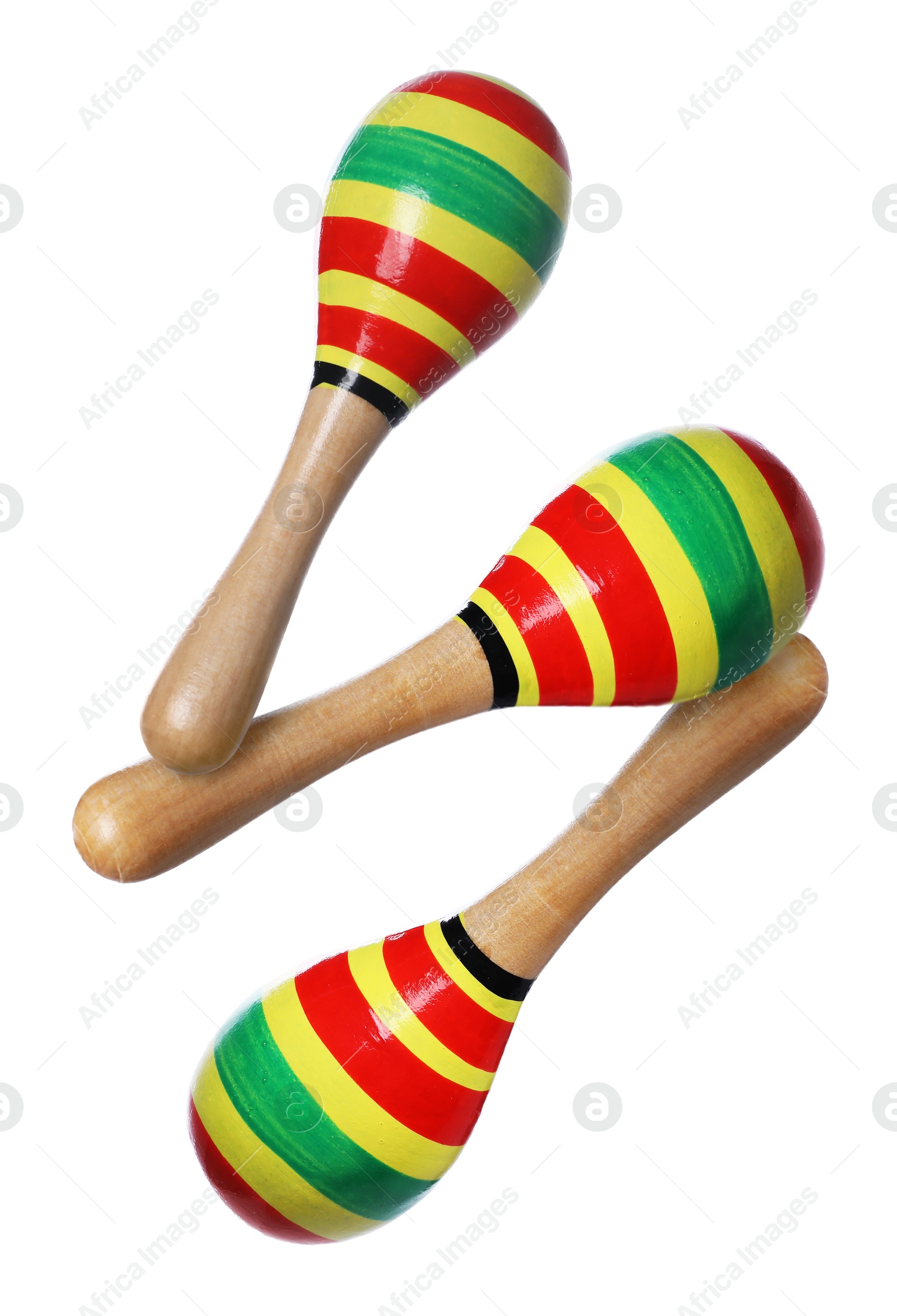 Toy maracas in air on white background. Child's musical instrument Image of Toy maracas in air on white background. Child's musical instrument