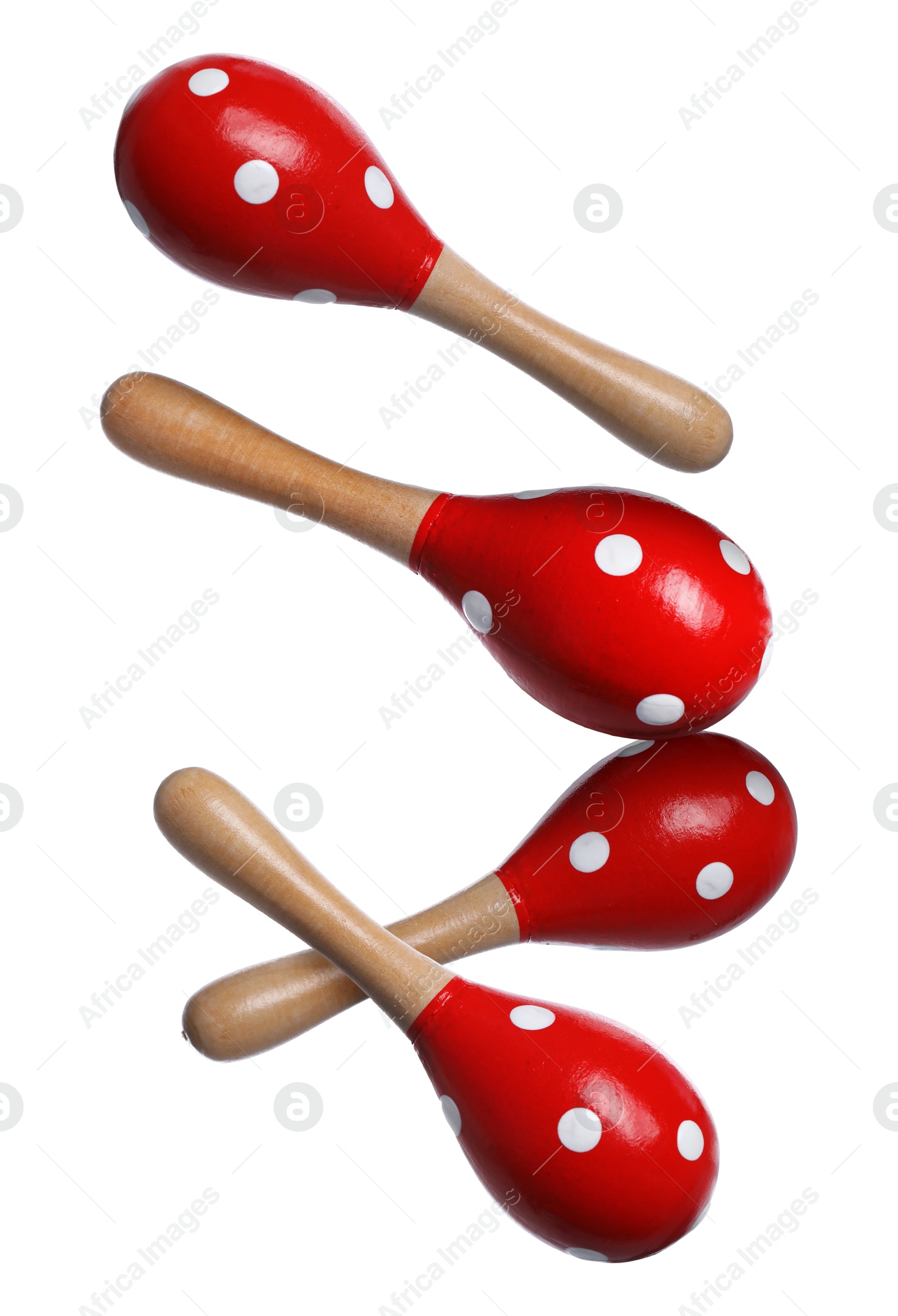 Toy maracas in air on white background. Child's musical instrument Image of Toy maracas in air on white background. Child's musical instrument