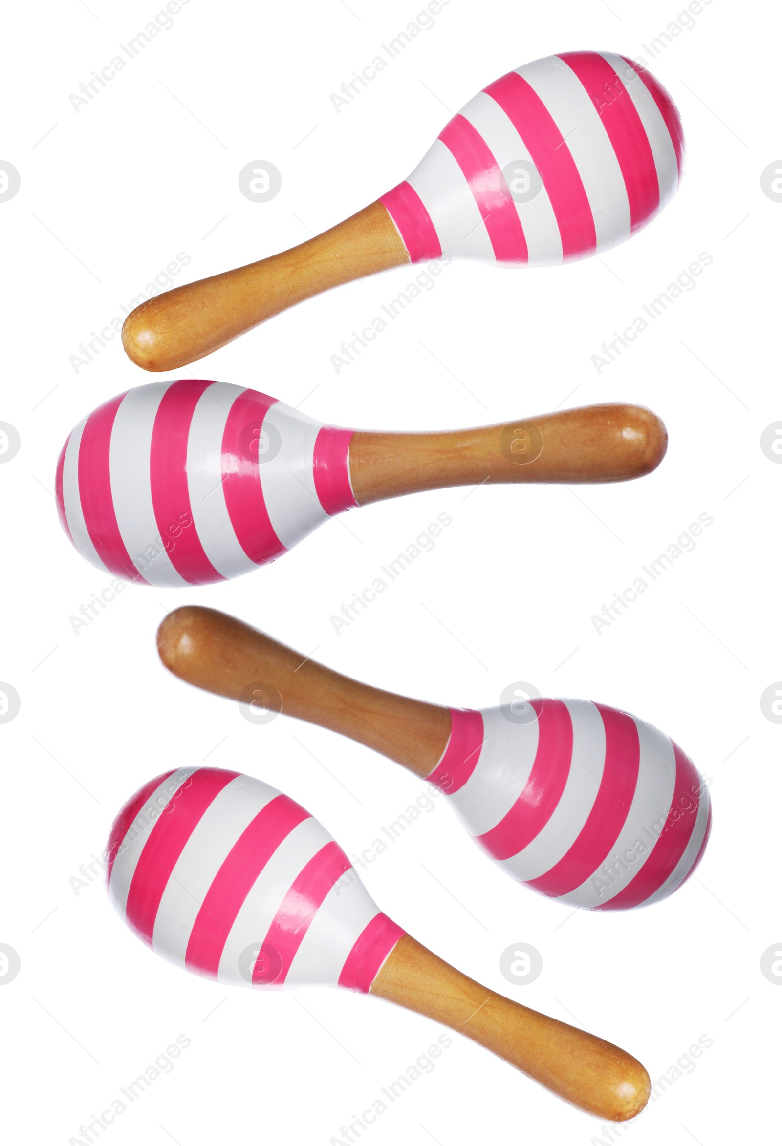 Toy maracas in air on white background. Child's musical instrument Image of Toy maracas in air on white background. Child's musical instrument