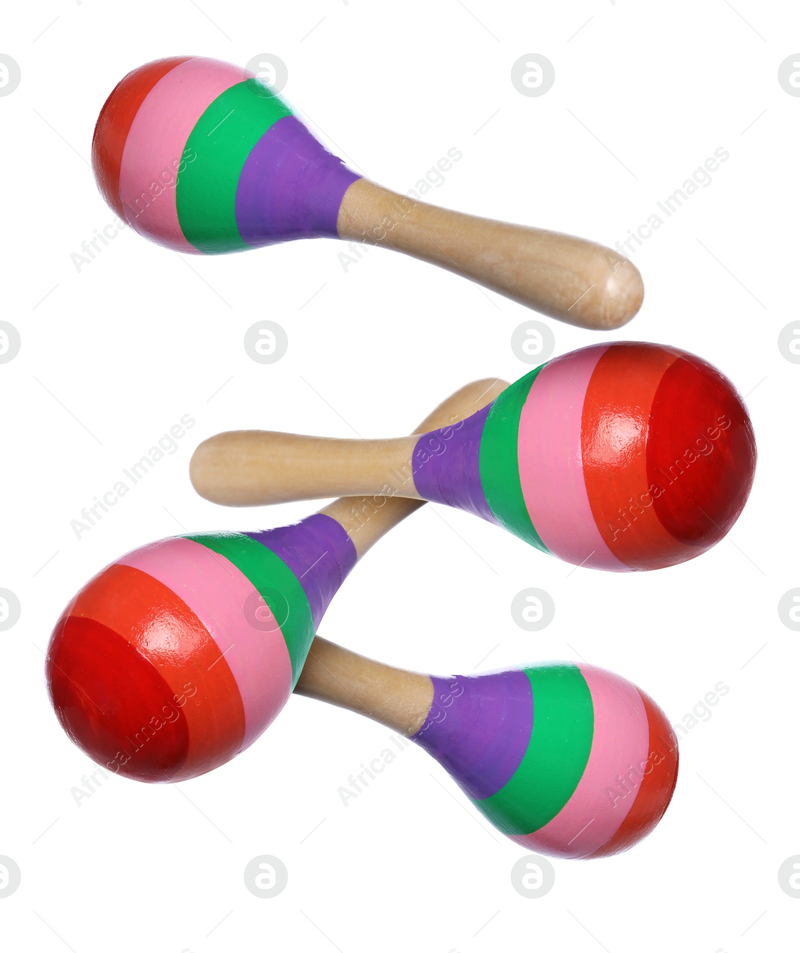 Toy maracas in air on white background. Child's musical instrument Image of Toy maracas in air on white background. Child's musical instrument