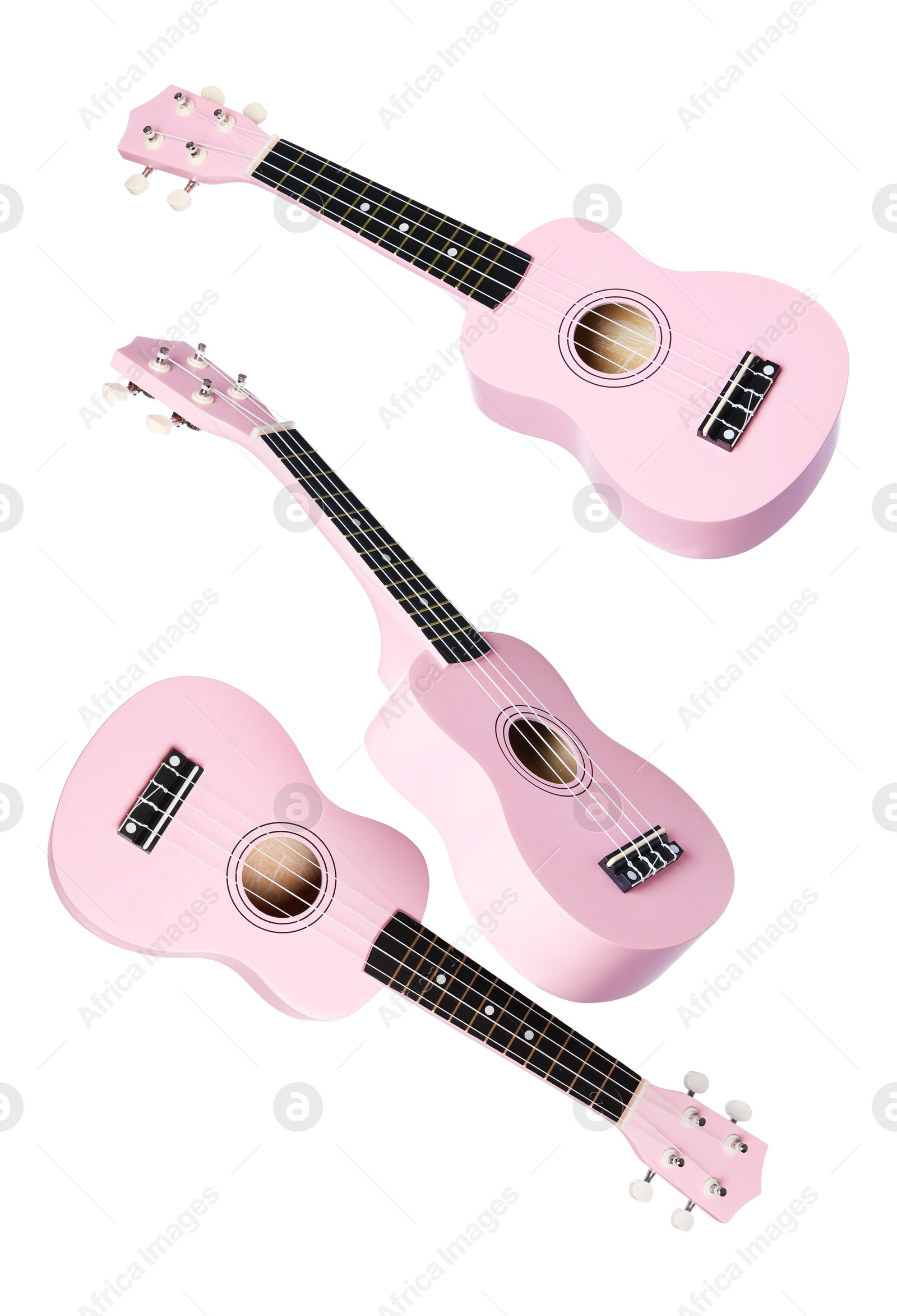 Toy guitars in air on white background. Child's musical instrument Image of Toy guitars in air on white background. Child's musical instrument