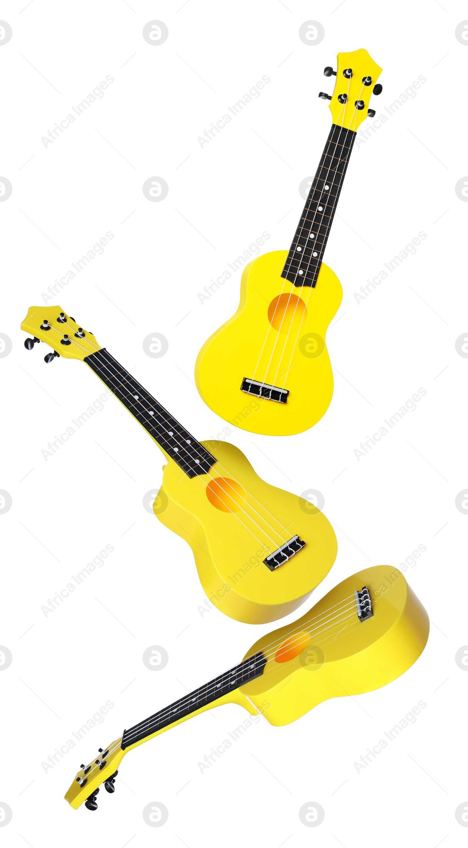 Toy guitars in air on white background. Child's musical instrument Image of Toy guitars in air on white background. Child's musical instrument