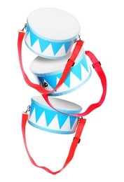 Image of Toy drums in air on white background. Child's musical instrument