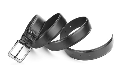 Photo of One black leather belt isolated on white