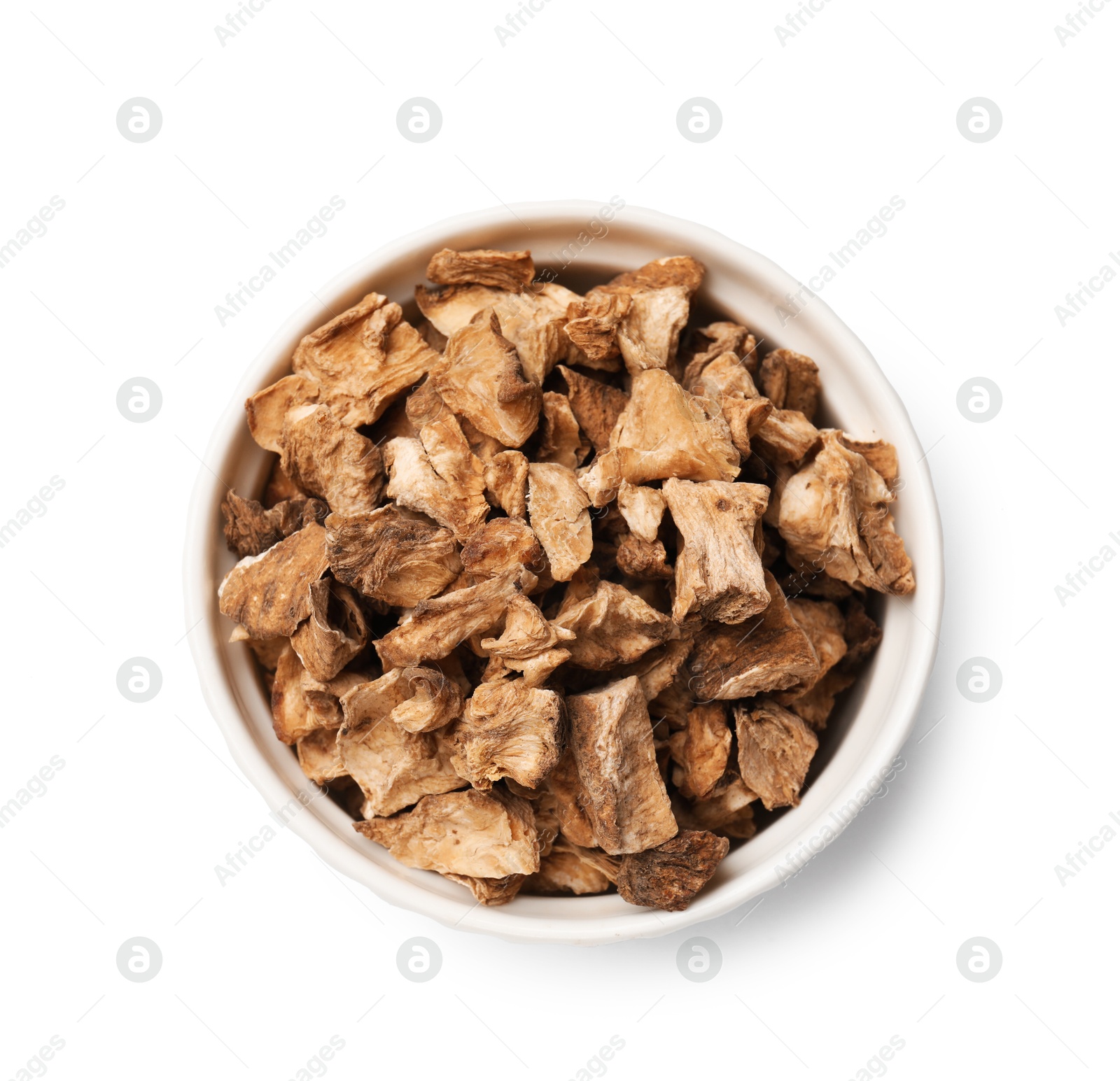 Pieces of dry chicory roots in bowl isolated on white, top view Photo of Pieces of dry chicory roots in bowl isolated on white, top view
