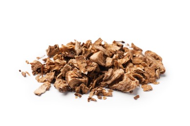 Photo of Pile of dry chicory roots isolated on white
