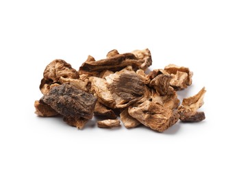 Photo of Pile of dry chicory roots isolated on white