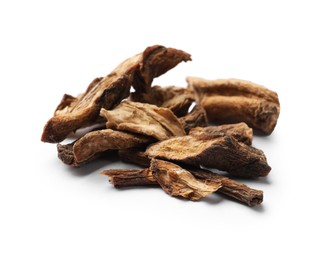 Photo of Pile of dry chicory roots isolated on white