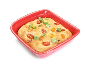 Photo of Delicious focaccia with tomatoes and spices in baking dish isolated on white