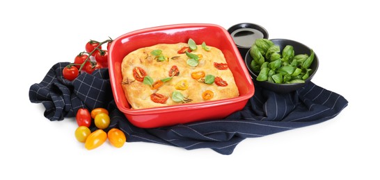 Photo of Delicious focaccia with tomatoes, basil, rosemary and oil isolated on white