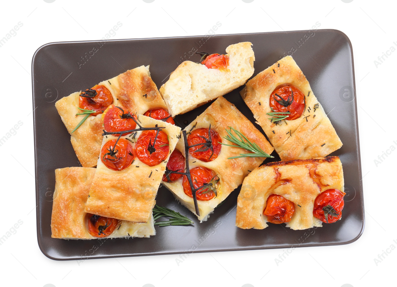 Pieces of delicious focaccia with tomatoes and spices isolated on white, top view Photo of Pieces of delicious focaccia with tomatoes and spices isolated on white, top view