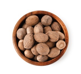 Photo of Nutmegs in bowl isolated on white, top view