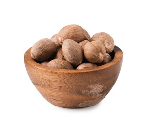 Photo of Fresh nutmegs in bowl isolated on white