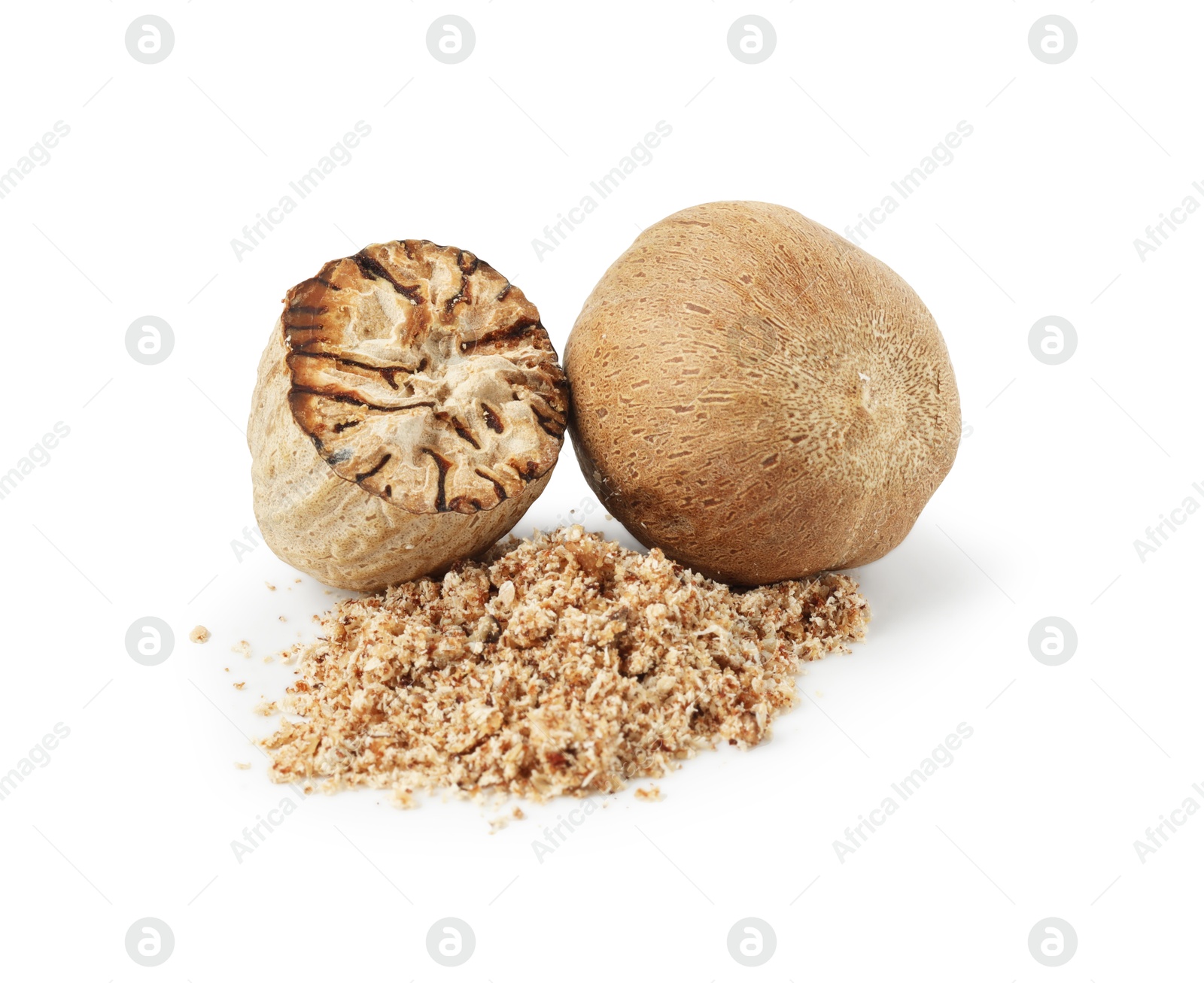 Whole, cut nutmegs and powder isolated on white Photo of Whole, cut nutmegs and powder isolated on white
