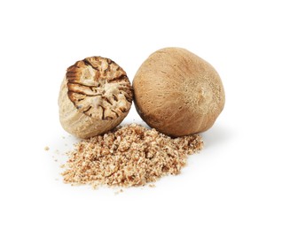 Photo of Whole, cut nutmegs and powder isolated on white