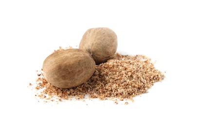 Photo of Whole nutmegs and powder isolated on white