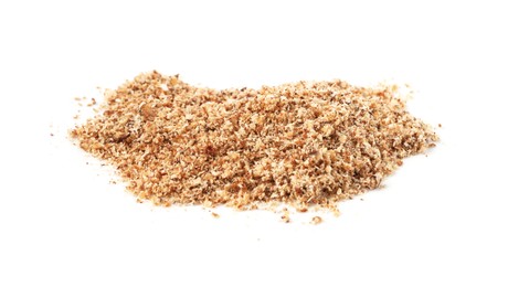 Photo of Pile of nutmeg powder isolated on white