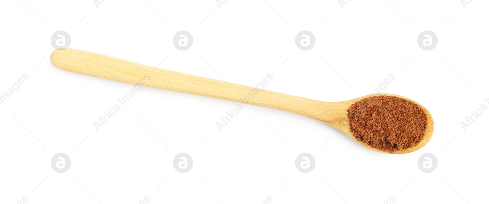 Nutmeg powder in spoon isolated on white, top view Photo of Nutmeg powder in spoon isolated on white, top view