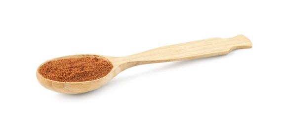 Photo of Nutmeg powder in spoon isolated on white