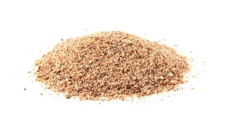 Photo of Pile of nutmeg powder isolated on white